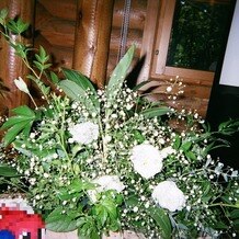 ニドムリゾートウエディングの画像｜高砂横の装花