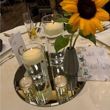 アルコラッジョ（ａｒｃｏｒａｇｇｉｏ）の写真｜テーブル装花