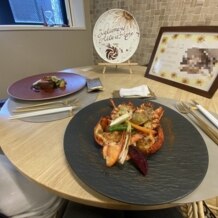 AILE d’ANGE NAGOYA（エルダンジュ ナゴヤ）の画像｜試食の料理と、
披露宴会場の見学時にサプライズしていただいたときの写真。
