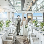 クサツエストピアホテル：【草津駅すぐ】地上90m、天空チャペルで交わす誓い。滋賀の絶景と美食に浸る結婚式
