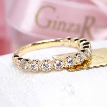 Ginza Rim／銀座リム:【銀座リム／ミラ】お花のように愛らしい、ミル打ちで囲まれたダイヤモンドリング