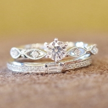 ＯＲＥＣＣＨＩＯ（オレッキオ）:＜パッショナート＞婚約指輪　 ティアラのようなアームのデザイン