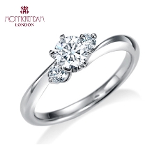 ＴＡＫＥＵＣＨＩ　ＢＲＩＤＡＬ:センターダイヤが際立つウェーブとサイドメレが魅力の洗練されたデザインの婚約指輪