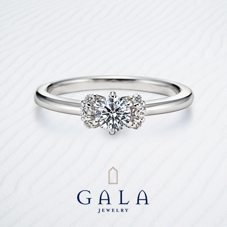 【GALA】メレダイヤがリボンのようにセッティングされたキュートなデザイン