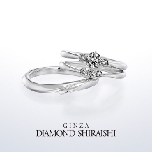 銀座ダイヤモンドシライシ:女性用のマリッジのダイヤ３石は、蝶々結びのリボンの輪を表現【レガーレ】