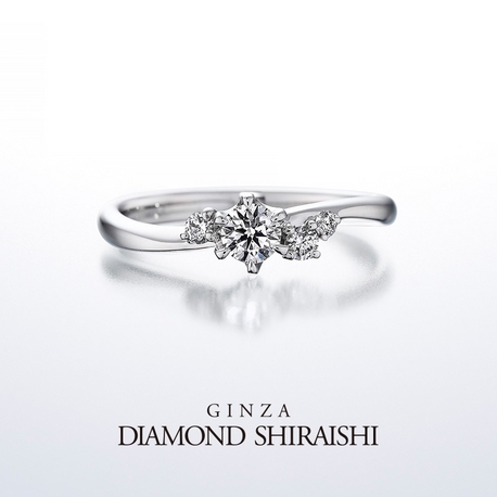 銀座ダイヤモンドシライシ:女の子のキラキラした笑顔を花々に重ねたエンゲージリング【スマイリング スズラン】