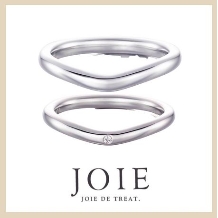 JOIE de treat. (ジョア ドゥ トリート）:【指がすっきりと見えるデザイン】1石ダイヤがポイントのエレガントな曲線フォルム