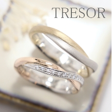 TRESOR（トレゾア）:union（結びつき）流れるダイヤモンドが美しく輝く大人リング。