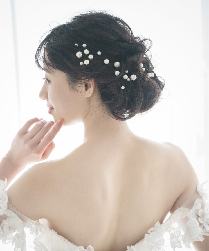 ウエディングドレス　髪型　ローシニヨン