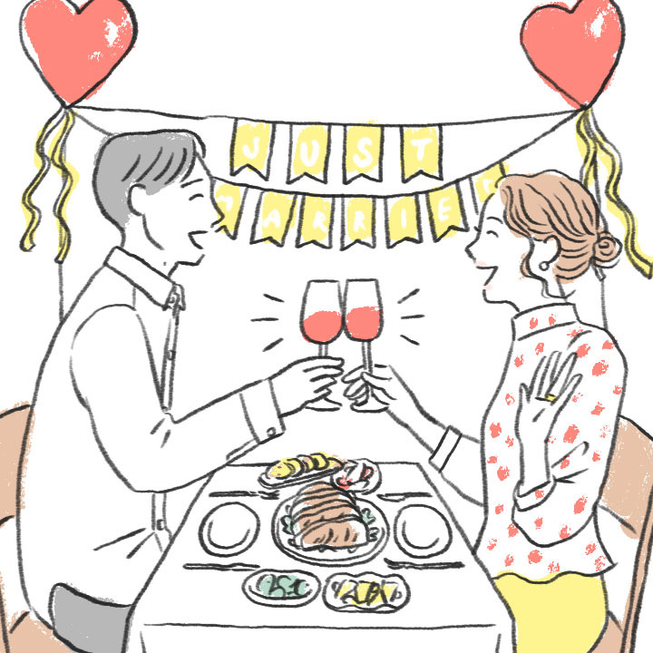 特別なおうちごはんを食べているカップル